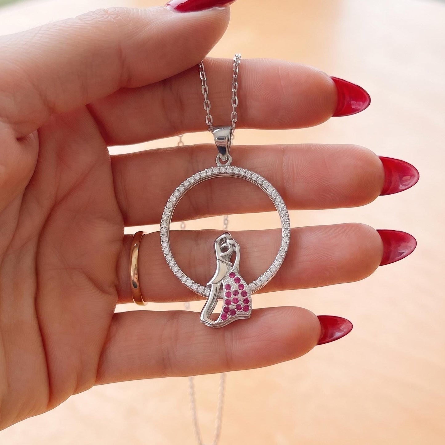 Hugging Couple Necklace in Sterling Silver with Elegant Zircon Stone