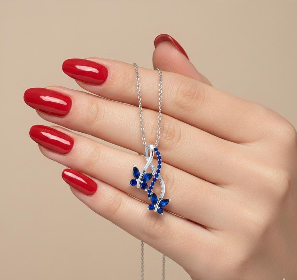 Sterling Silver Infinity Butterfly Sapphire Necklace - September Birthstone
