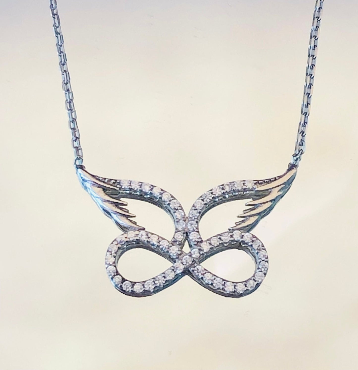 Angel Wing Infinity Necklace - Stunning Sterling Silver Eternity Pendant -