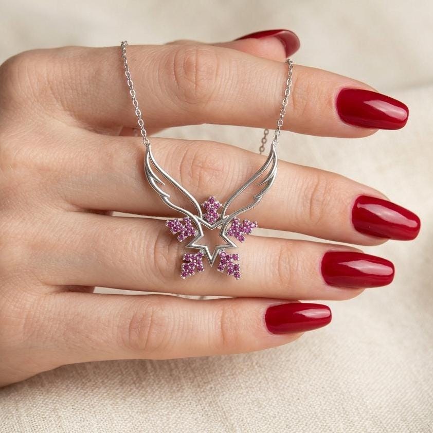Sterling Silver Angel Wing Snowflake Necklace Featuring Pink Zircon Gem