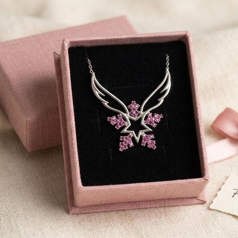 Sterling Silver Angel Wing Snowflake Necklace Featuring Pink Zircon Gem
