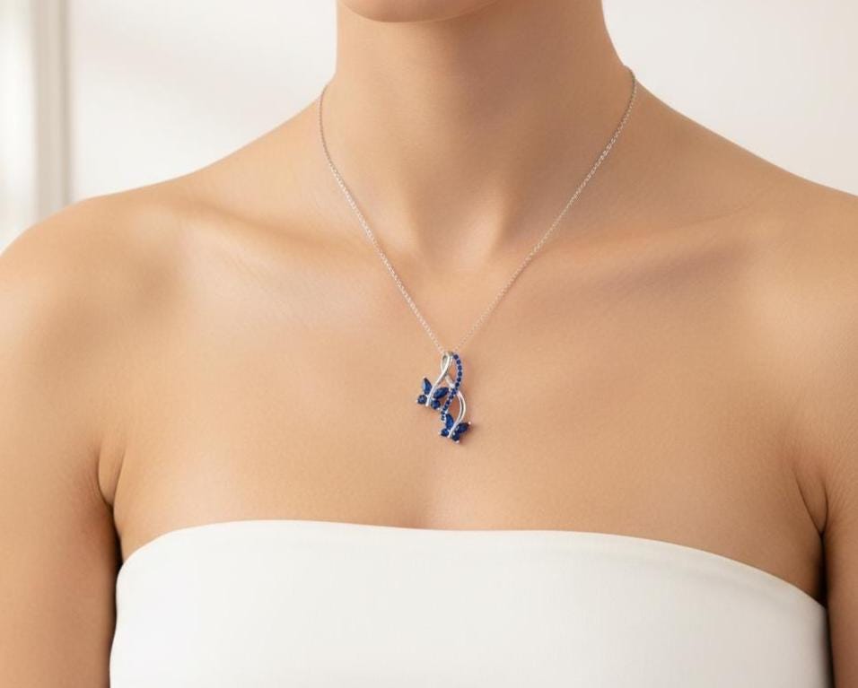 Sterling Silver Infinity Butterfly Sapphire Necklace - September Birthstone