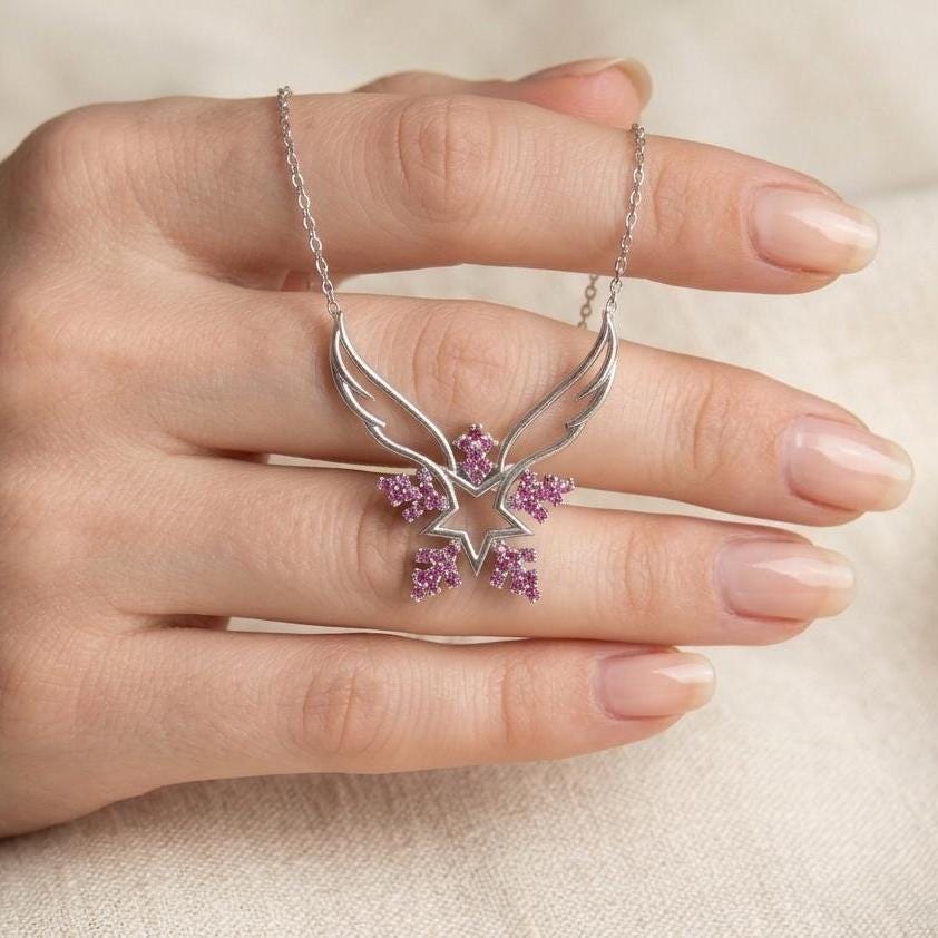 Sterling Silver Angel Wing Snowflake Necklace Featuring Pink Zircon Gem
