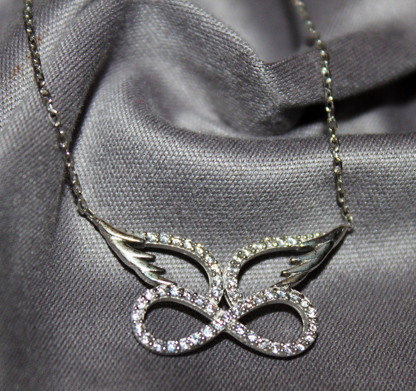 Angel Wing Infinity Necklace - Stunning Sterling Silver Eternity Pendant -