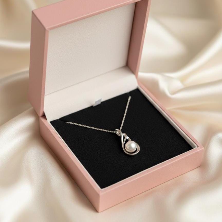 Silver Pearl Necklace featuring Delicate Angel Wings Design