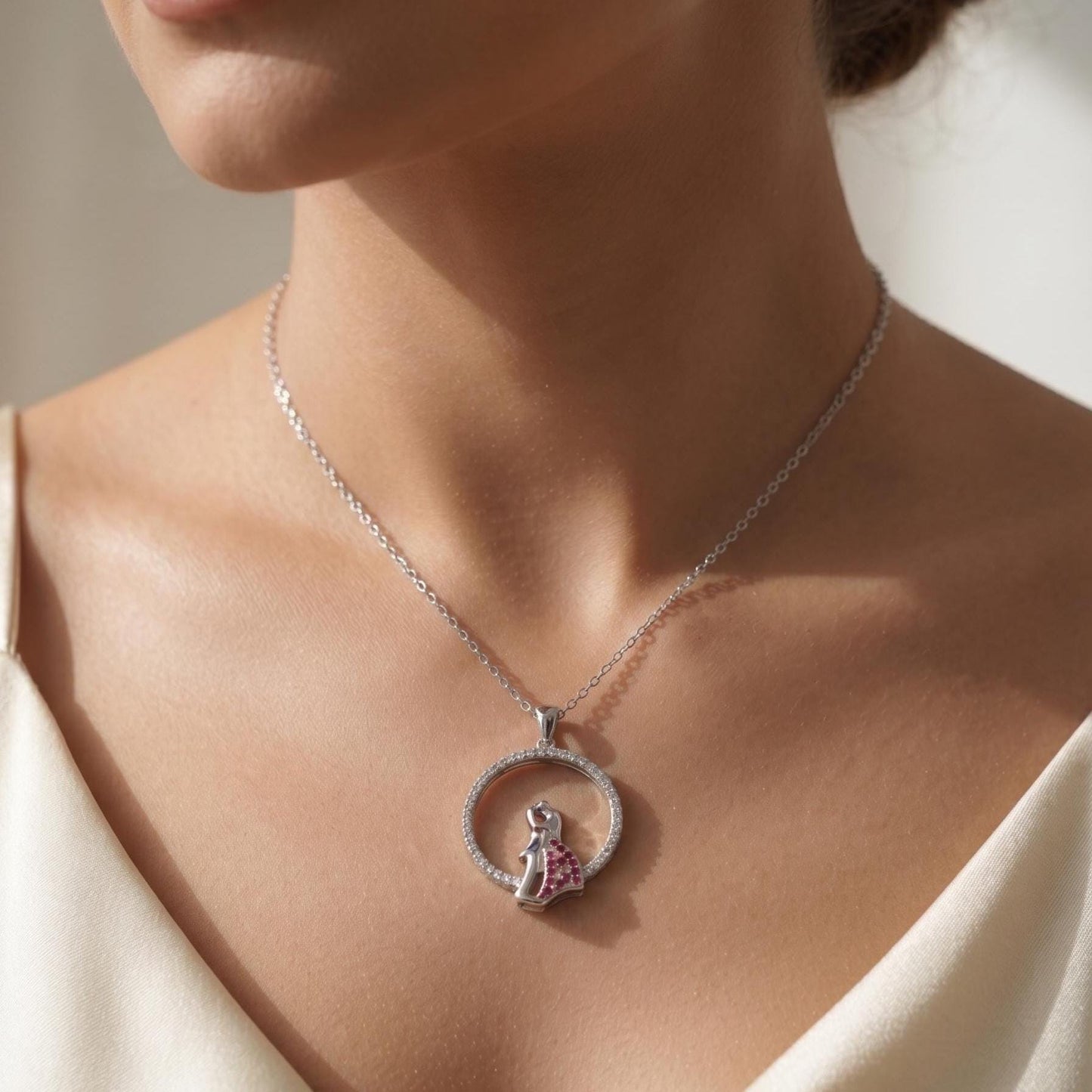 Hugging Couple Necklace in Sterling Silver with Elegant Zircon Stone