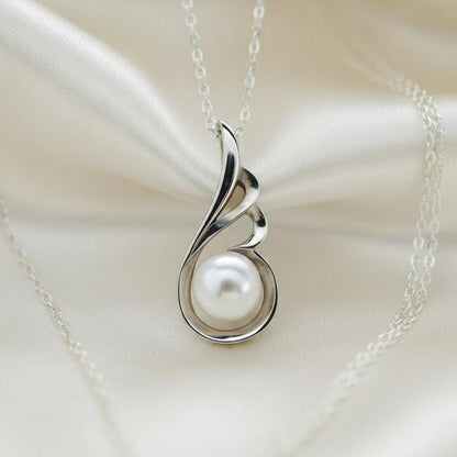 Silver Pearl Necklace featuring Delicate Angel Wings Design