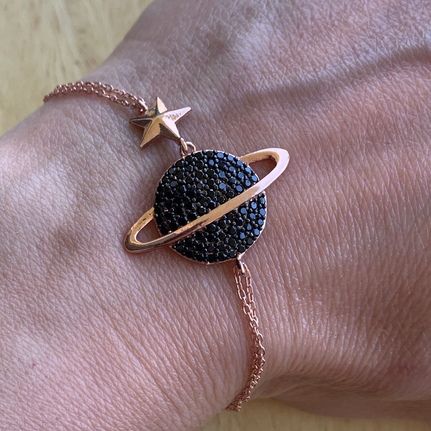 Sterling Silver Saturn Bracelet featuring Black Zircon Planet - Celestial Chic-Exclusive Gift for Her