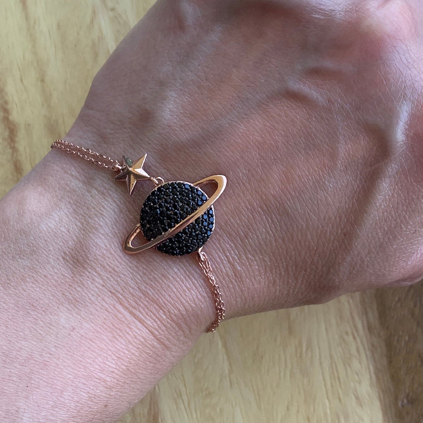 Sterling Silver Saturn Bracelet featuring Black Zircon Planet - Celestial Chic-Exclusive Gift for Her