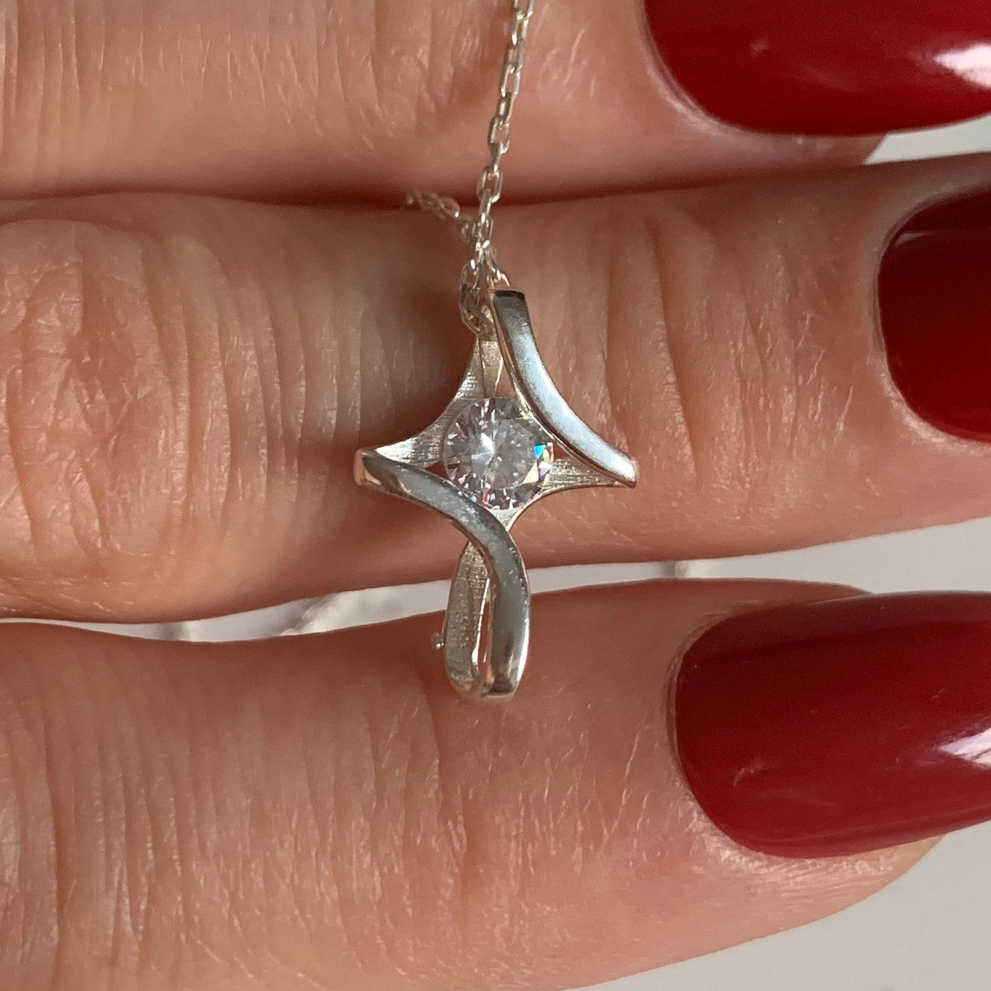 Camelia Cross and Solitaire Necklace